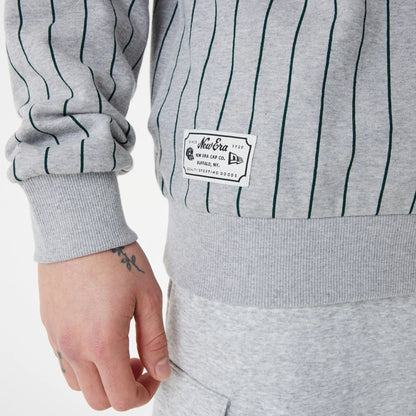 The Male model is wearing New Era Heritage Pinstripe Grey Oversized Hoodie 5