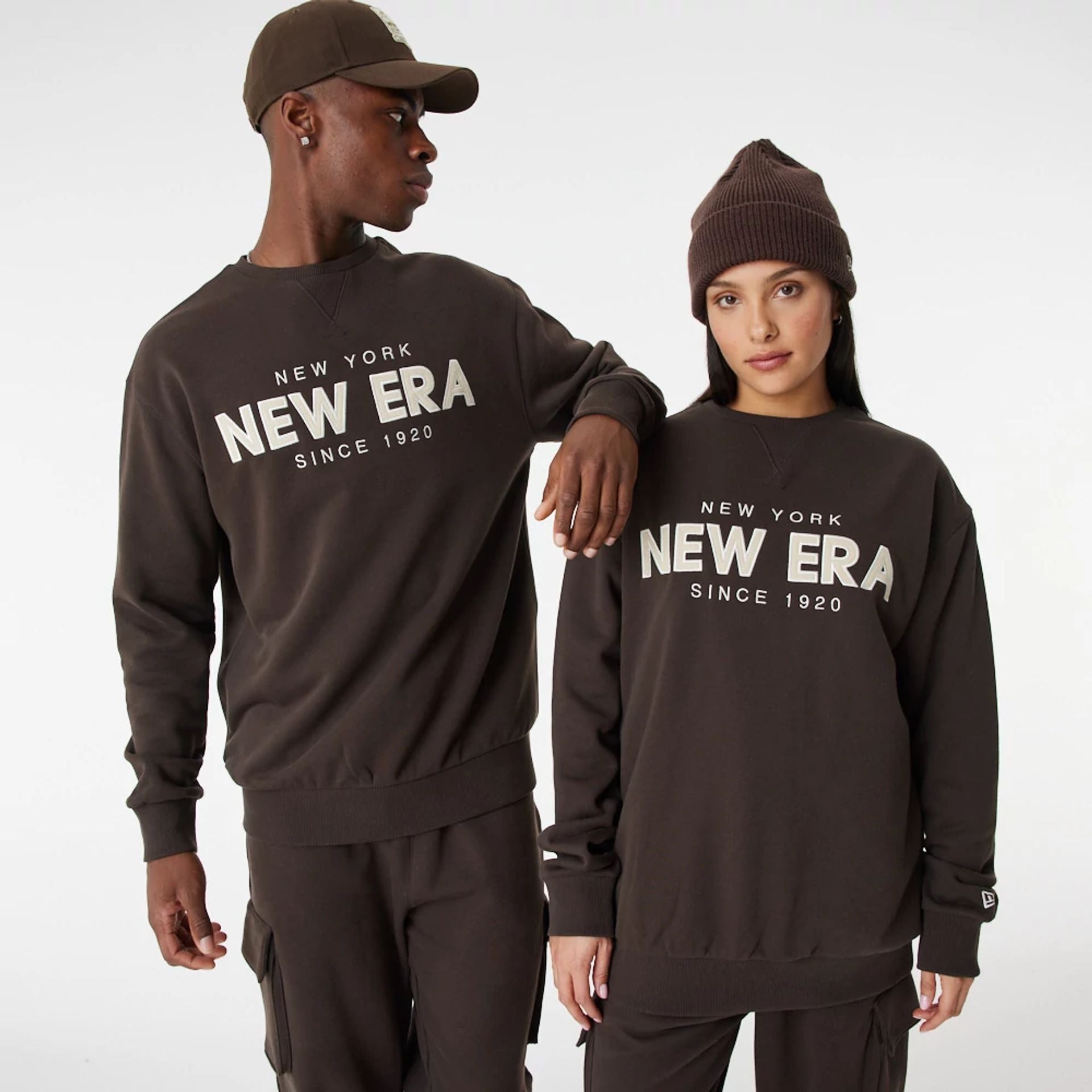 The Male model is wearing New Era Heritage Brown Crew Neck Sweatshirt 2