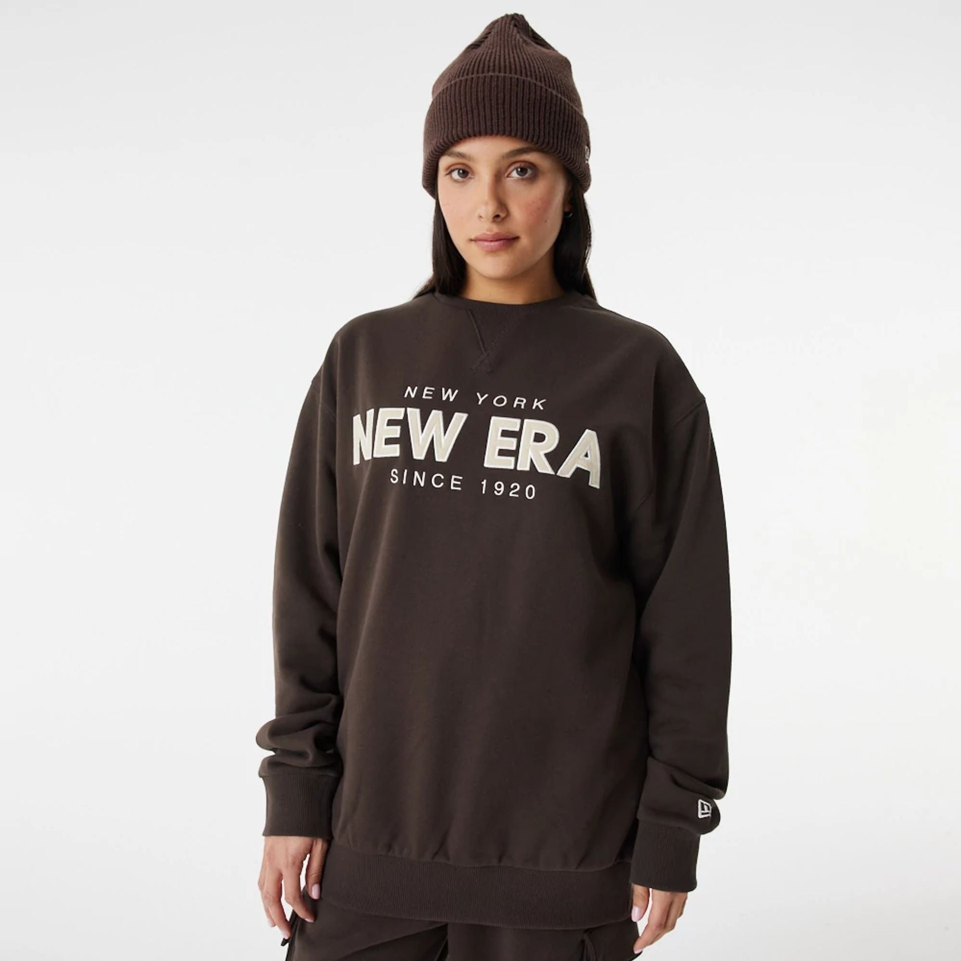 The Male model is wearing New Era Heritage Brown Crew Neck Sweatshirt 7