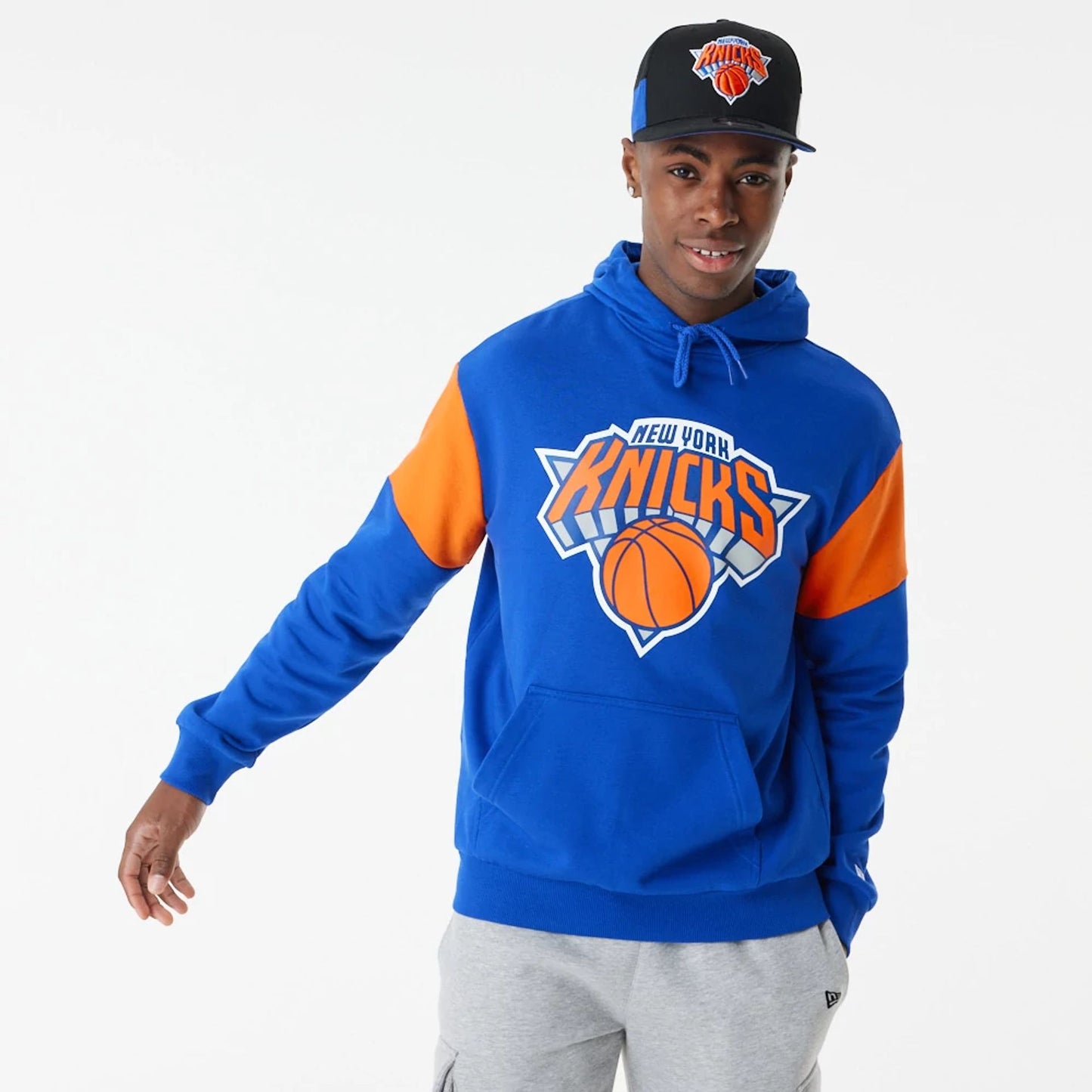 The Male model is wearing New York Knicks NBA Colour Block Blue Oversized Hoodie 9