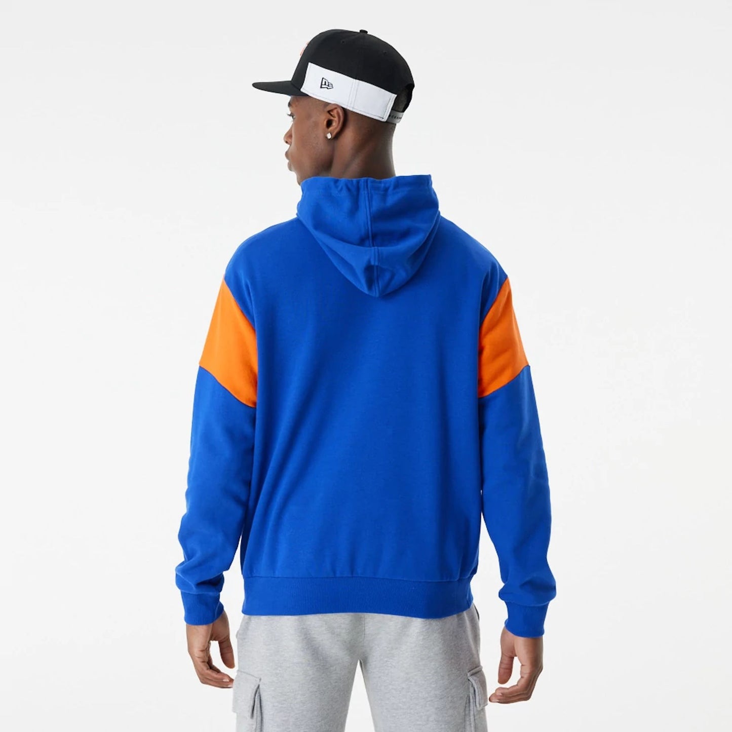 The Male model is wearing New York Knicks NBA Colour Block Blue Oversized Hoodie 3