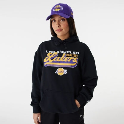 The Male model is wearing LA Lakers NBA Retro Graphic Black Oversized Hoodie 2