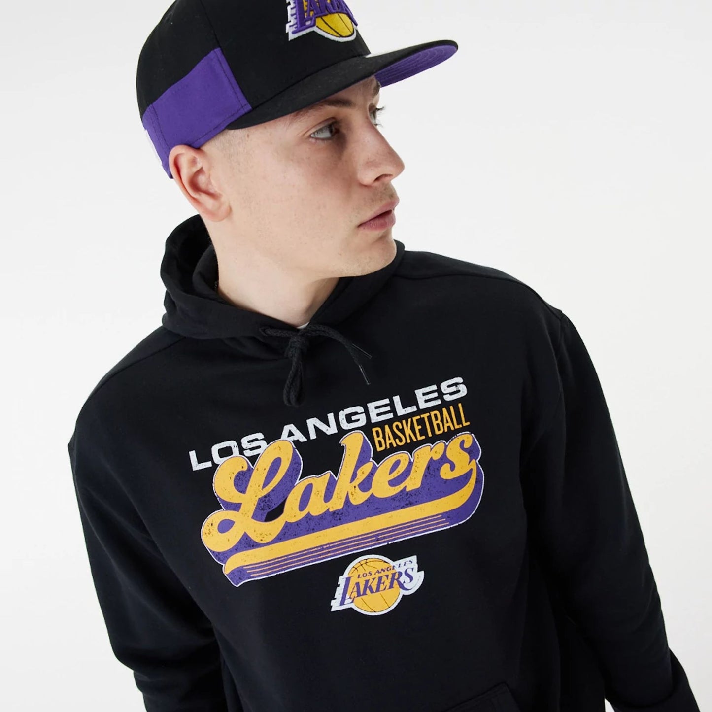 The Male model is wearing LA Lakers NBA Retro Graphic Black Oversized Hoodie 5