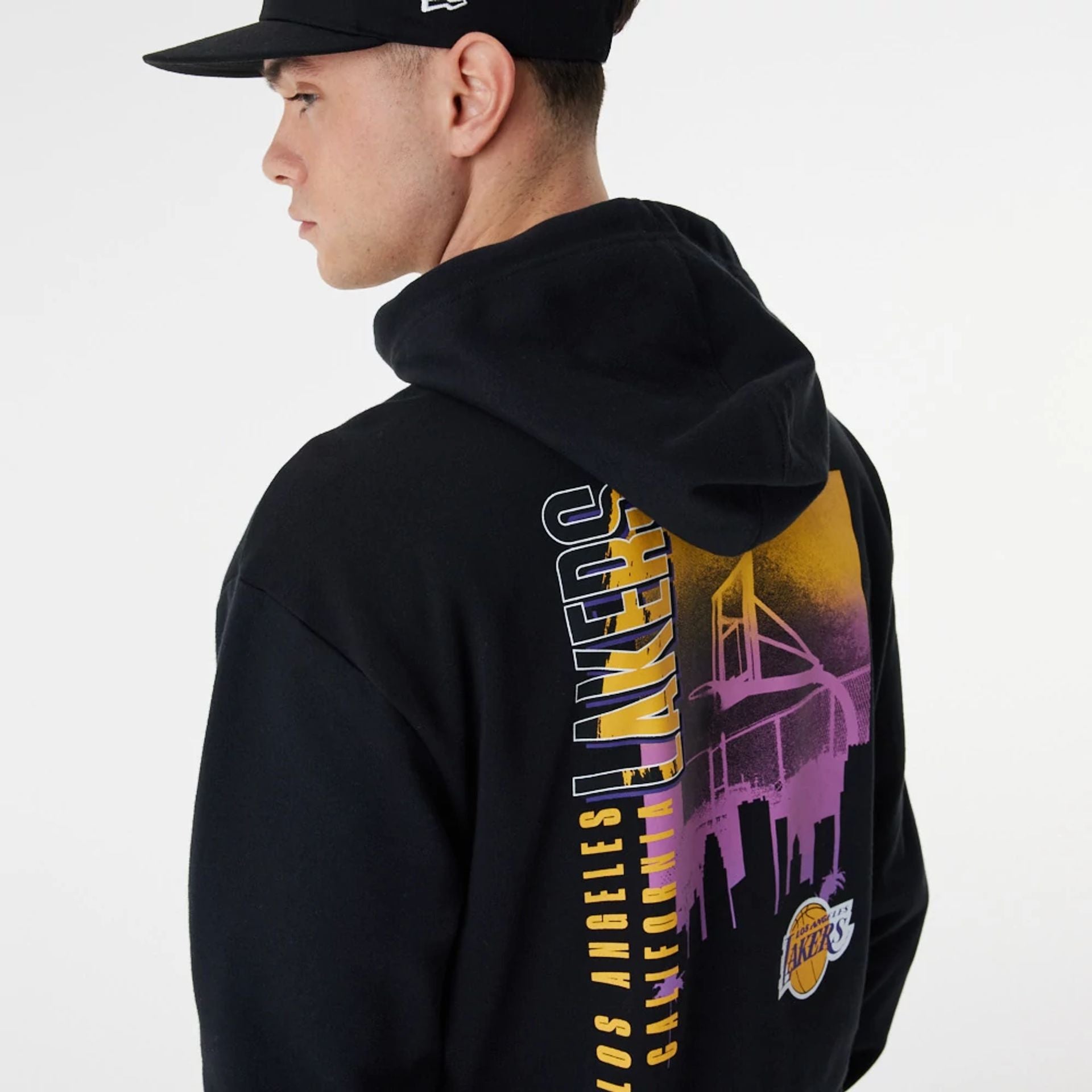 The Male model is wearing LA Lakers Skyline Graphic Black Oversized Hoodie 5