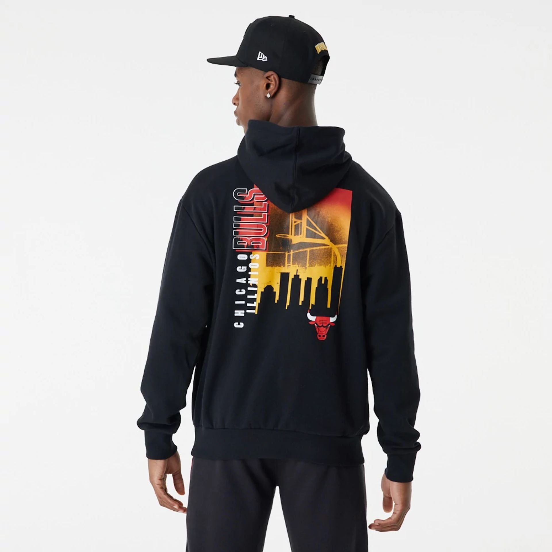 The Male model is wearing Chicago Bulls Skyline Graphic Black Oversized Hoodie 1