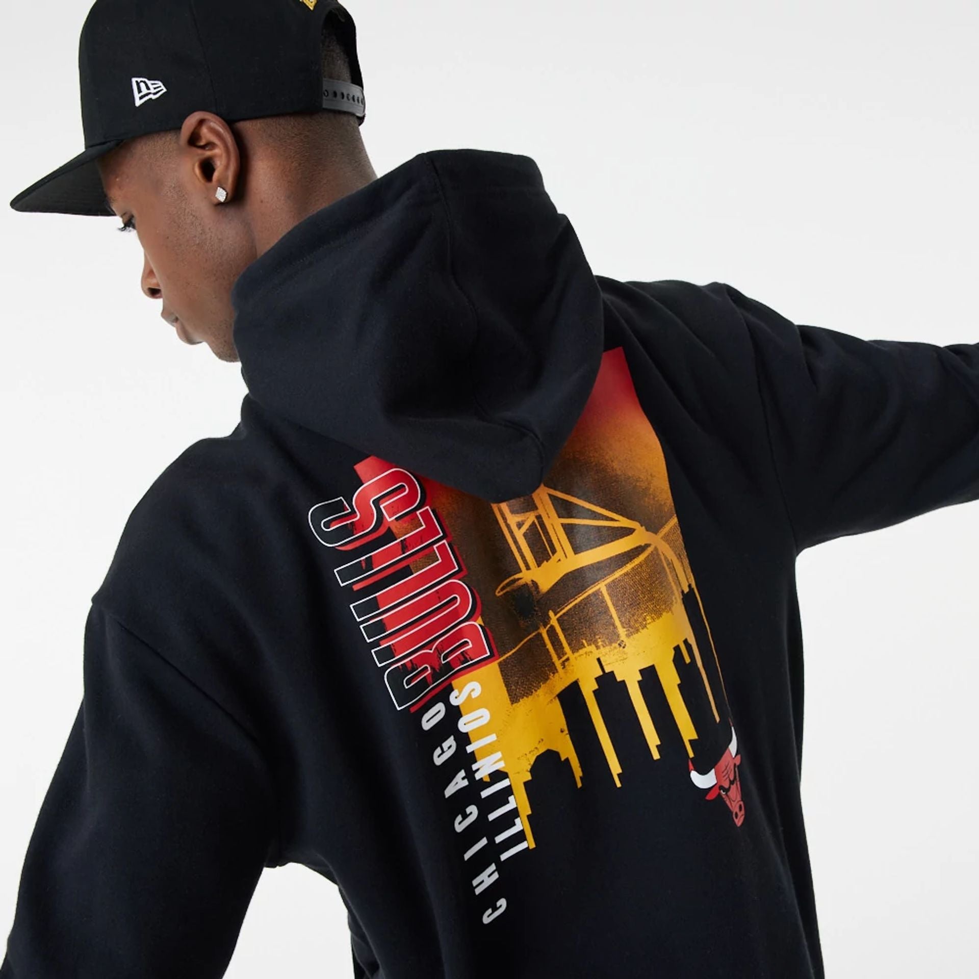 The Male model is wearing Chicago Bulls Skyline Graphic Black Oversized Hoodie 4