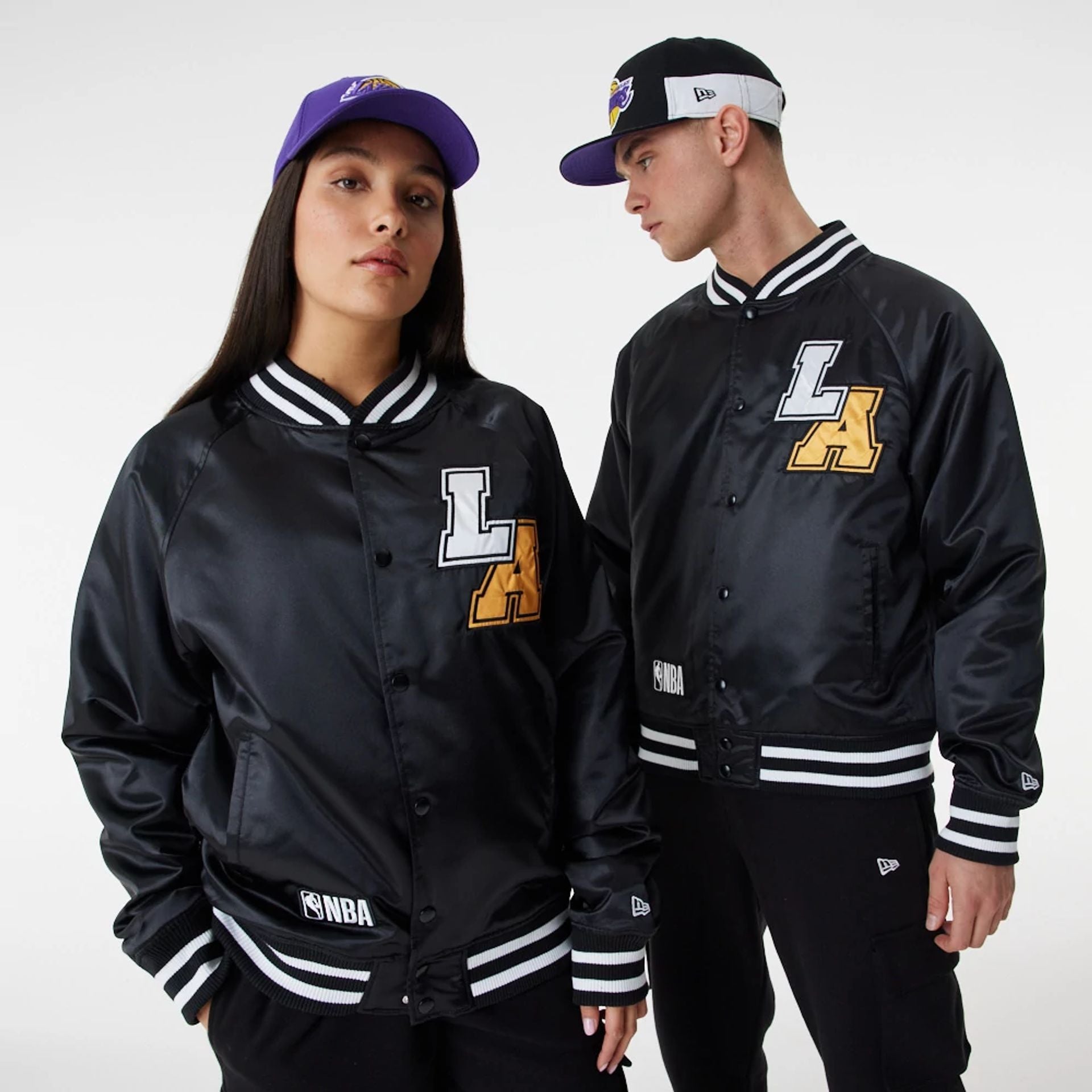 The Male model is wearing LA Lakers NBA Black Satin Bomber Jacket 1