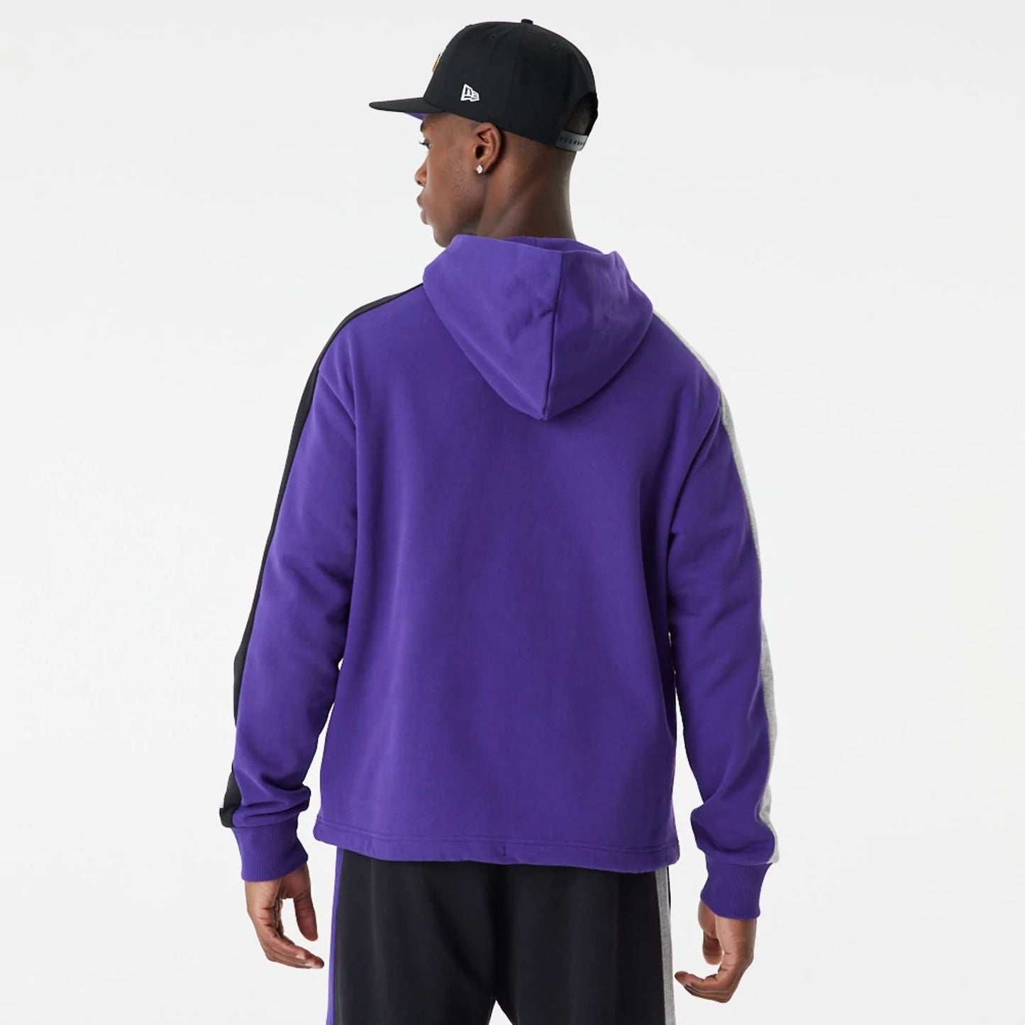 The Male model is wearing LA Lakers NBA Large Graphic Purple Oversized Hoodie 4