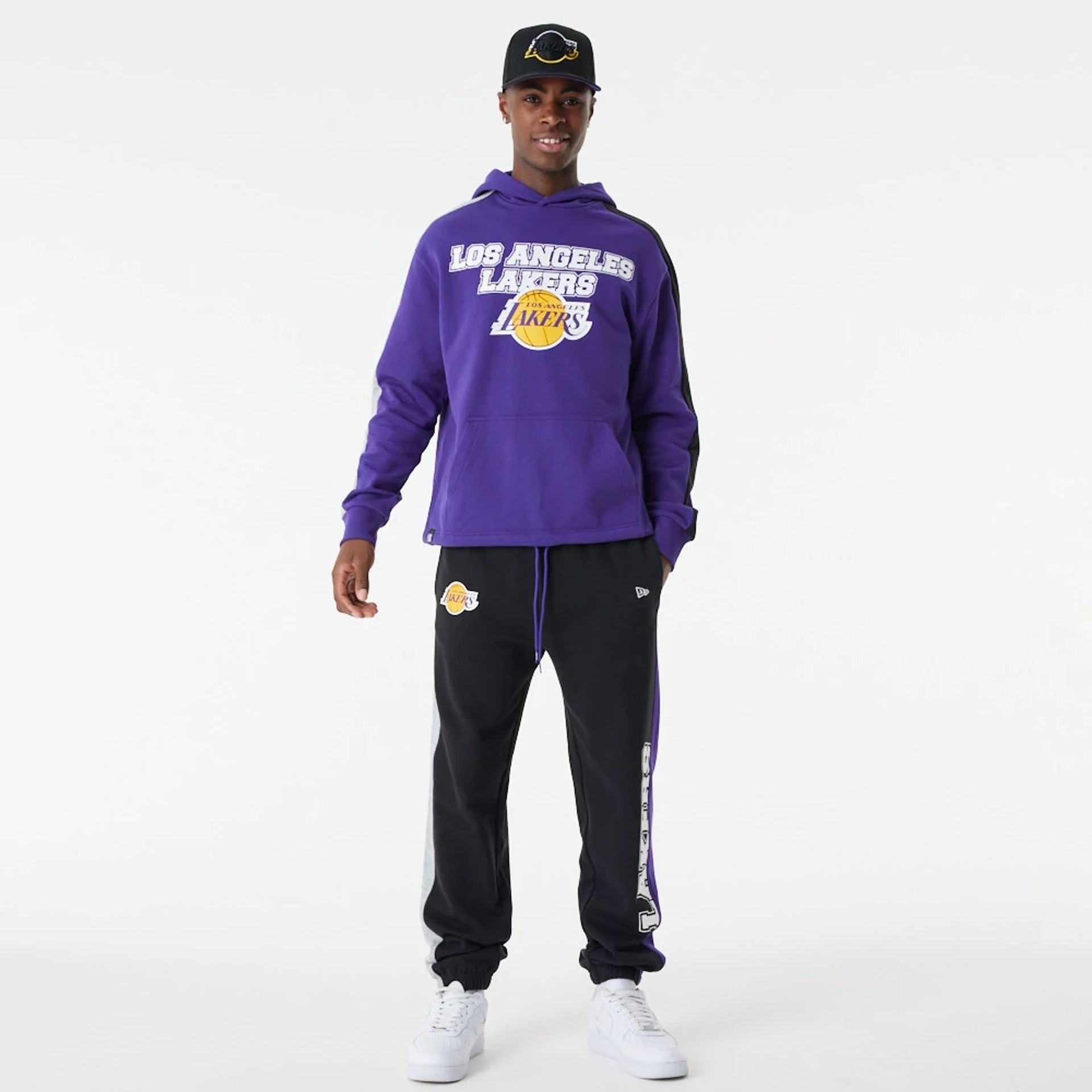 The Male model is wearing LA Lakers NBA Large Graphic Purple Oversized Hoodie 3