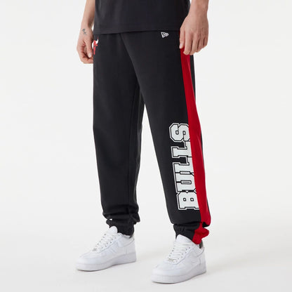 The Male model is wearing Chicago Bulls NBA Large Graphic Black Joggers 7