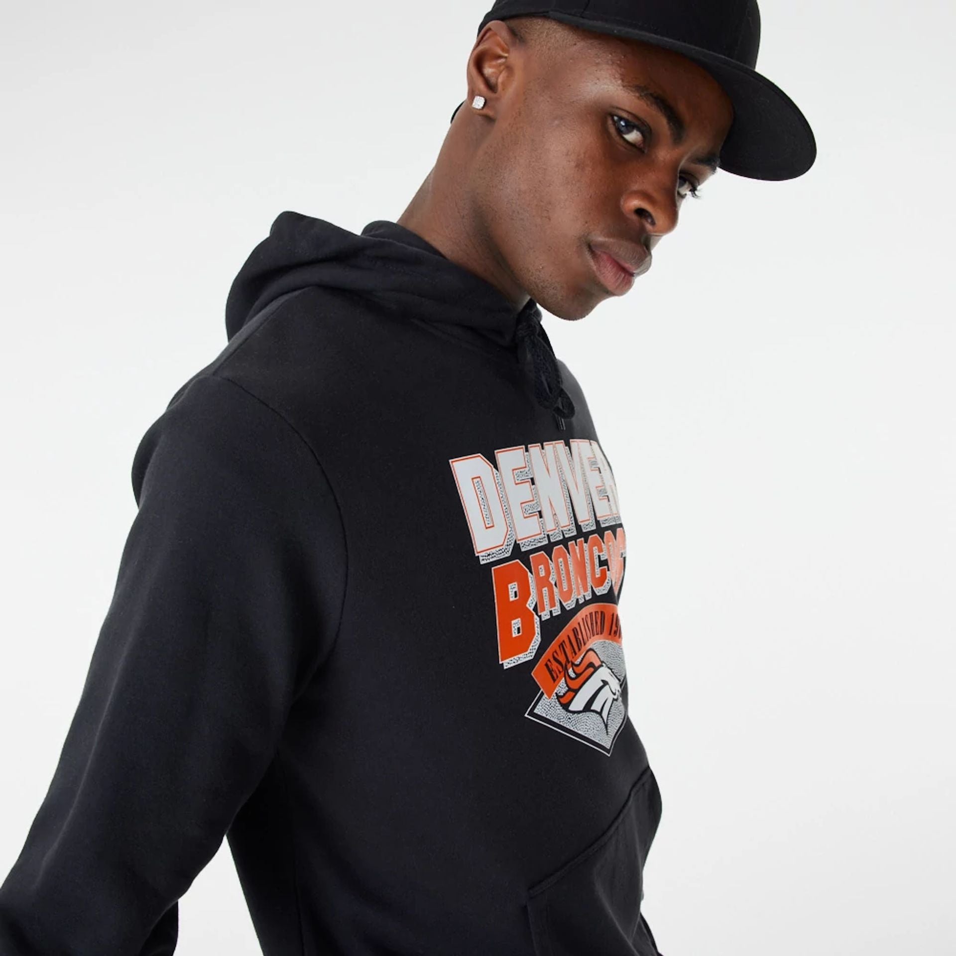 The Male model is wearing Denver Broncos NFL Team Graphic Black Pullover Hoodie 2