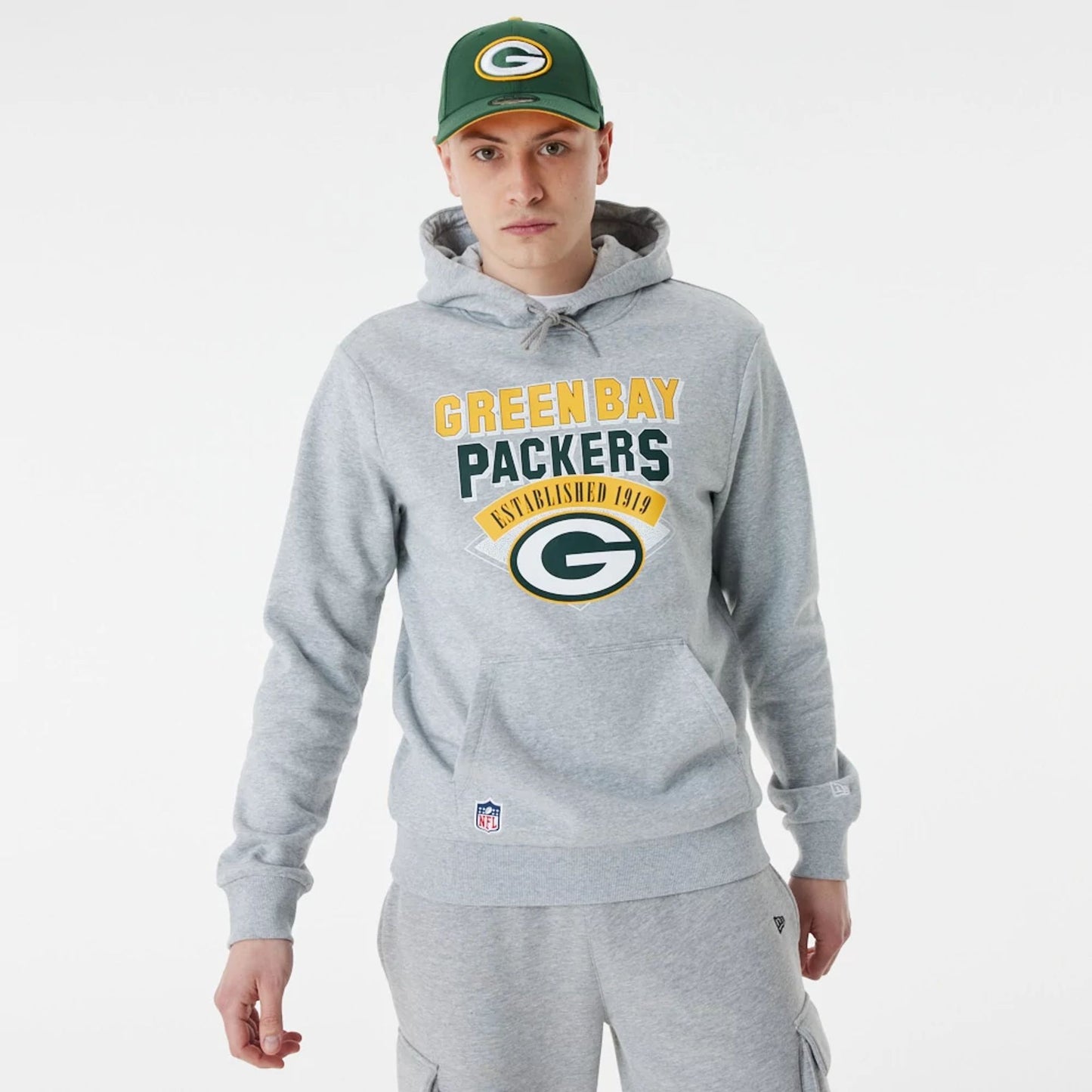 The Male model is wearing Green Bay Packers NFL Team Graphic Grey Pullover Hoodie 1