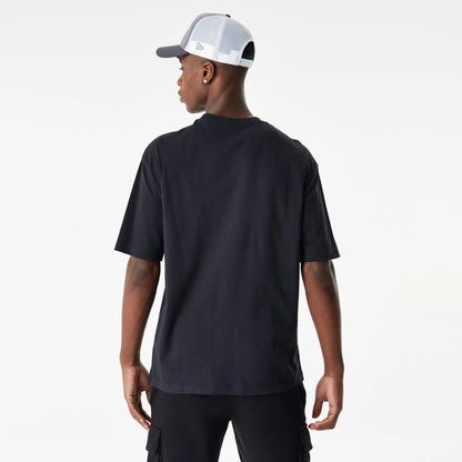 The Male model is wearing New Era Graphic Severed Snake Black Oversized T-Shirt 6