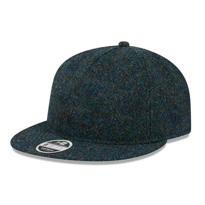 This is a New Era Harris Tweed Navy Retro Crown 9FIFTY Snapback Cap 1