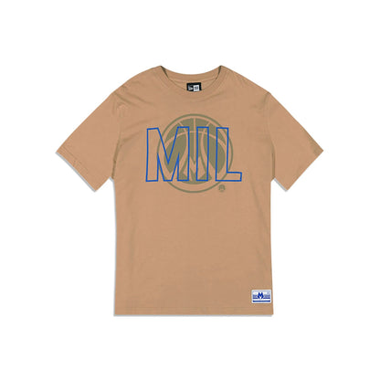 The Male model is wearing Milwaukee Bucks NBA City Edition Light Beige Oversized T-Shirt 1