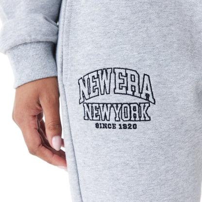 The Female model is wearing New Era Womens Arch Wordmark Grey Joggers 6