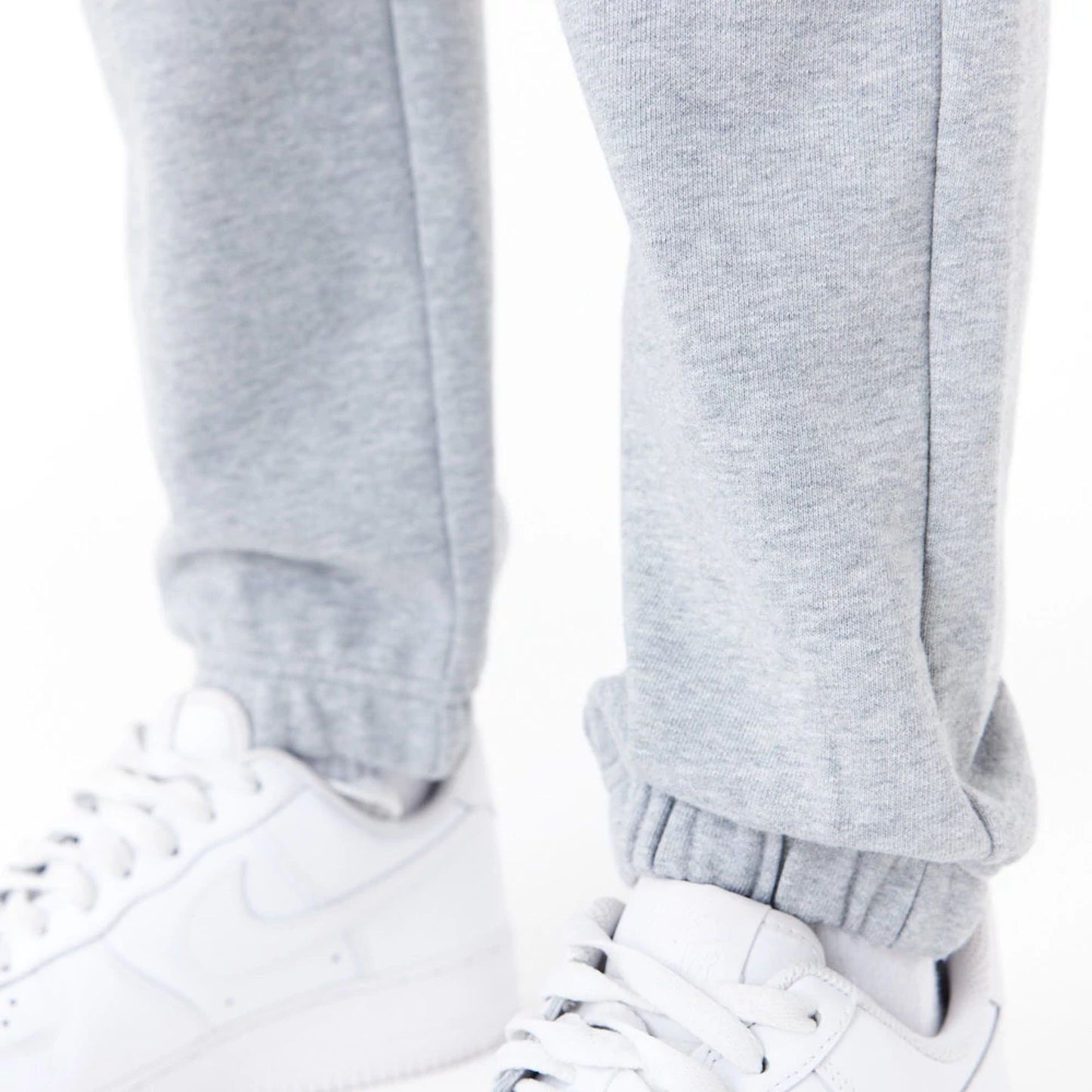 The Female model is wearing New Era Womens Arch Wordmark Grey Joggers 7