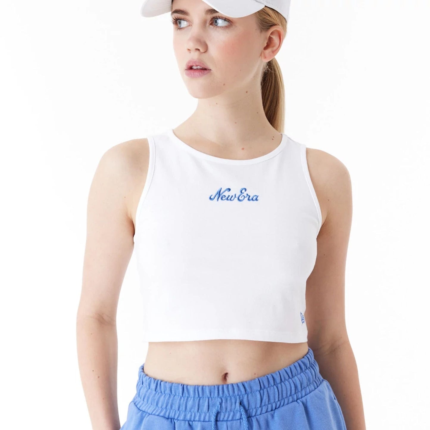 The Female model is wearing New Era Womens White Crop Tank Top 8