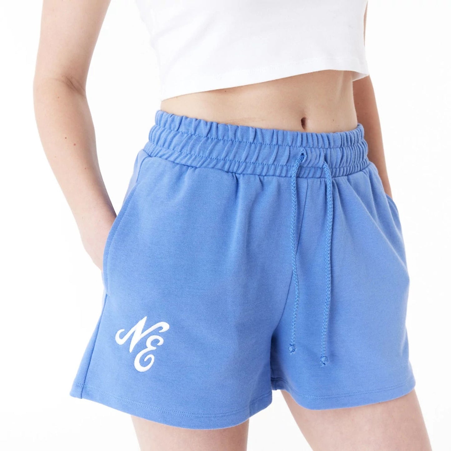 The Female model is wearing New Era Blue Womens Sweat Shorts 10