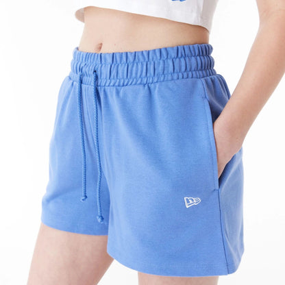 The Female model is wearing New Era Blue Womens Sweat Shorts 7