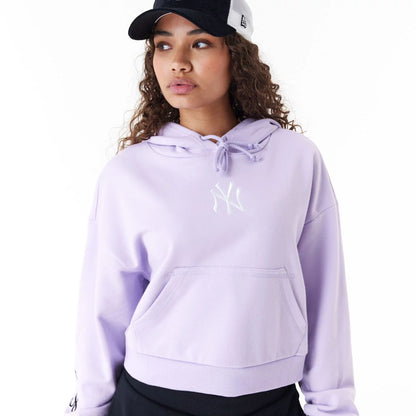 The Female model is wearing New York Yankees MLB Lifestyle Purple Womens Crop Pullover Hoodie 6