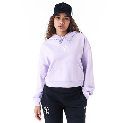 The Female model is wearing New York Yankees MLB Lifestyle Purple Womens Crop Pullover Hoodie 1