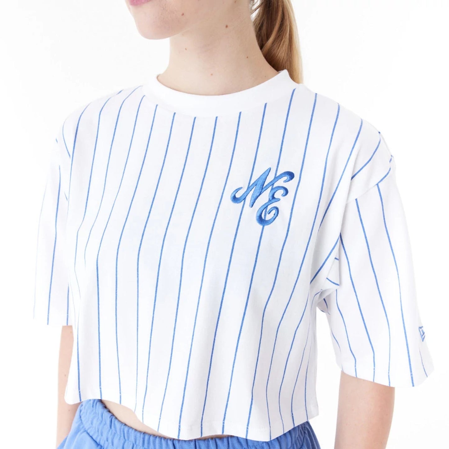 The Female model is wearing New Era Pinstripe White Womens Crop T-Shirt 6