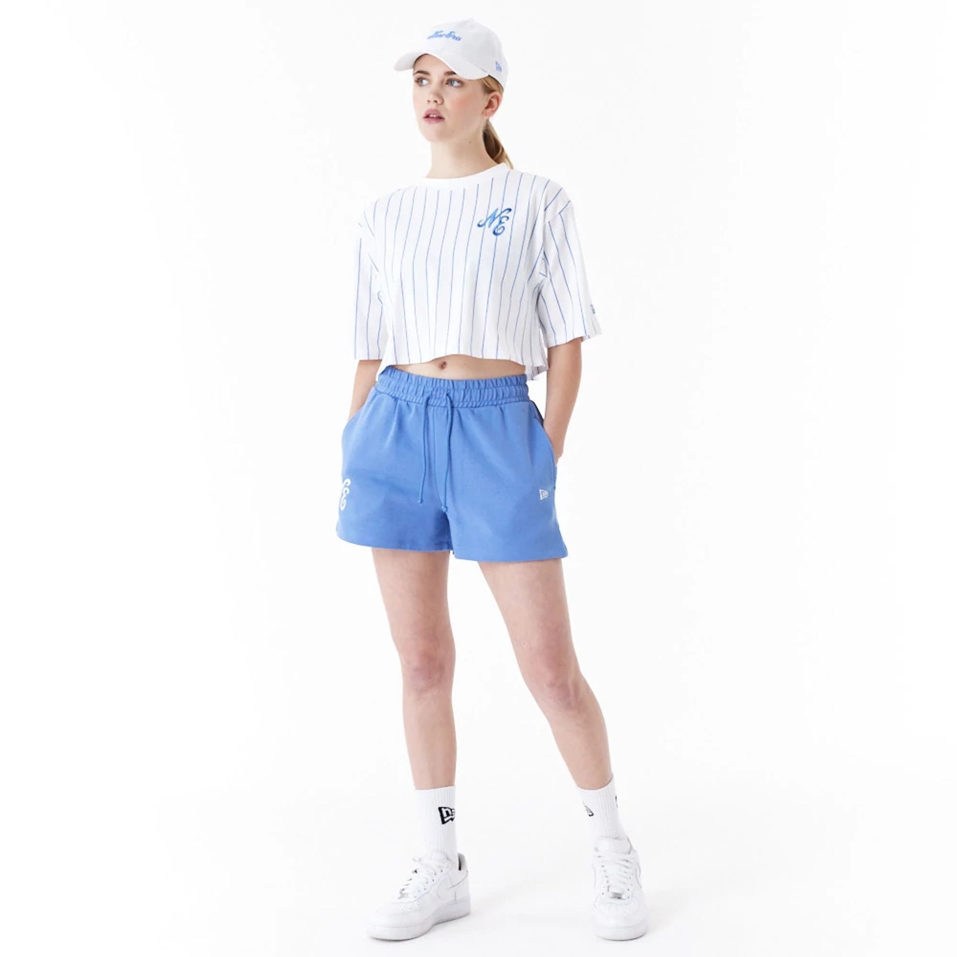 The Female model is wearing New Era Pinstripe White Womens Crop T-Shirt 2