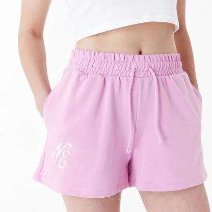 The Female model is wearing New Era Pink Womens Sweat Shorts 7