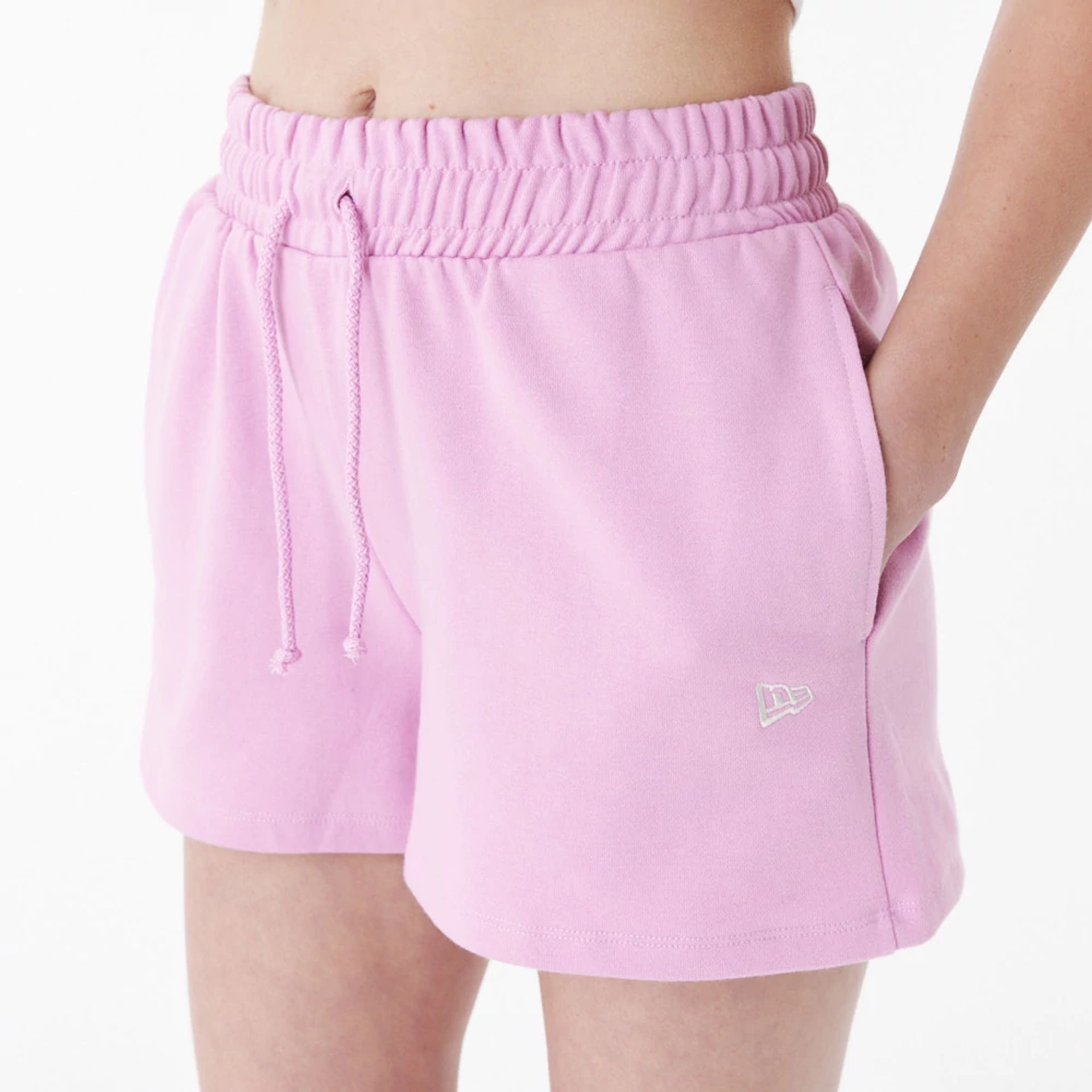 The Female model is wearing New Era Pink Womens Sweat Shorts 3