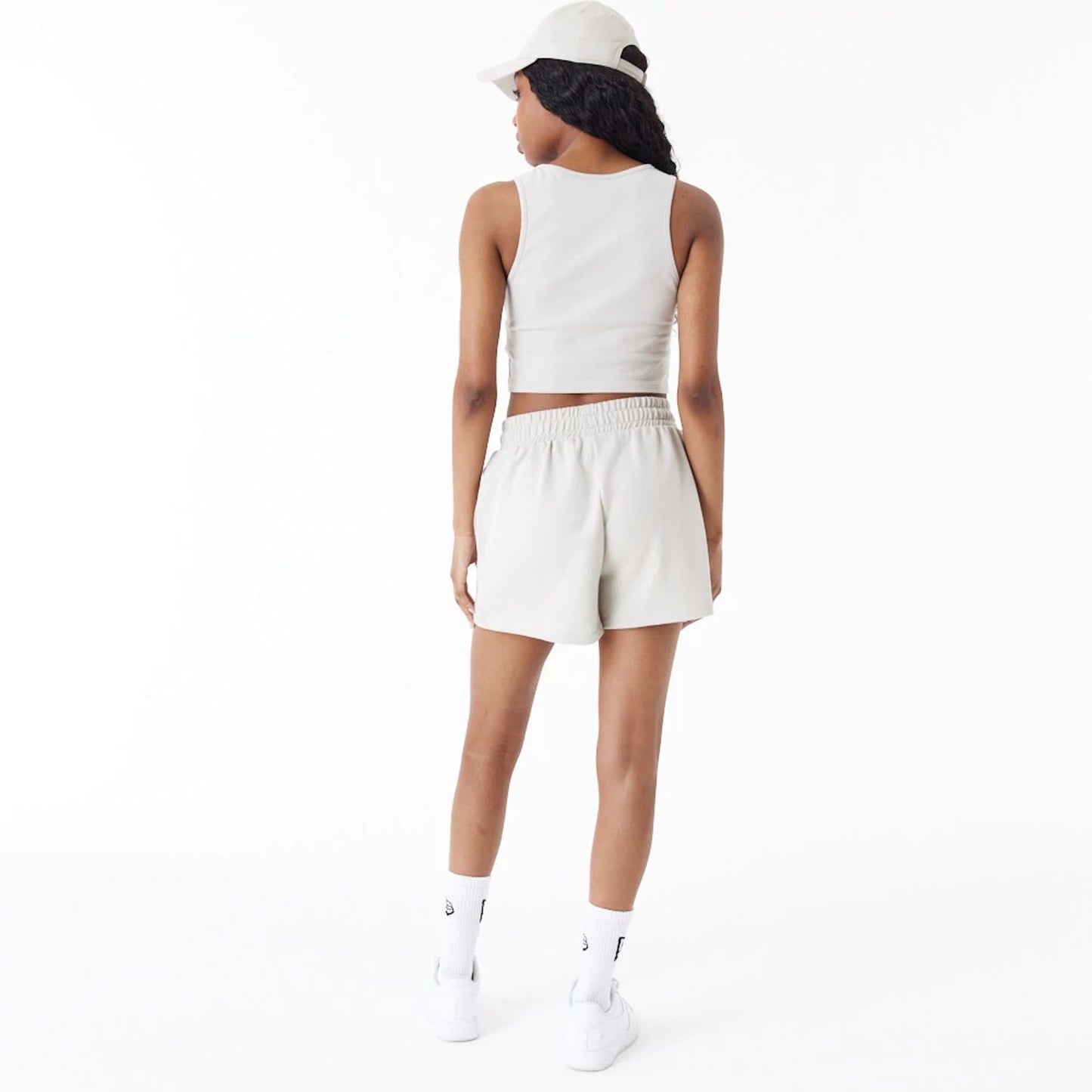 The Female model is wearing New Era Stone Womens Sweat Shorts 3