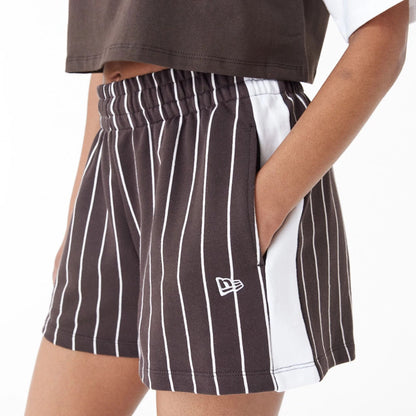 The Female model is wearing New York Yankees MLB Lifestyle Brown Shorts 5