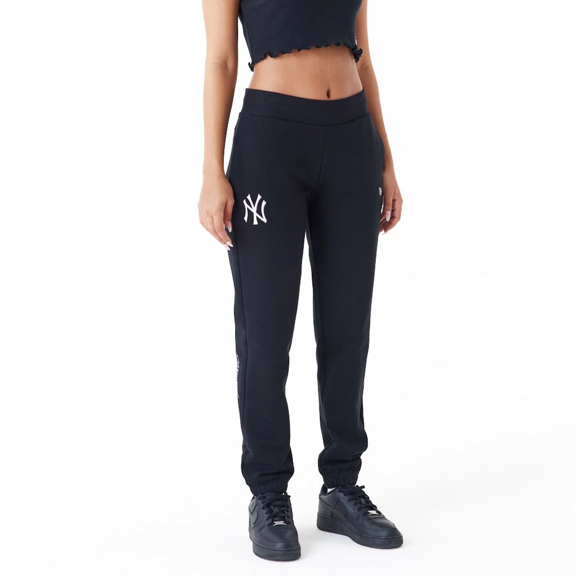 The Female model is wearing New York Yankees Womens MLB Lifestyle Black Joggers 1