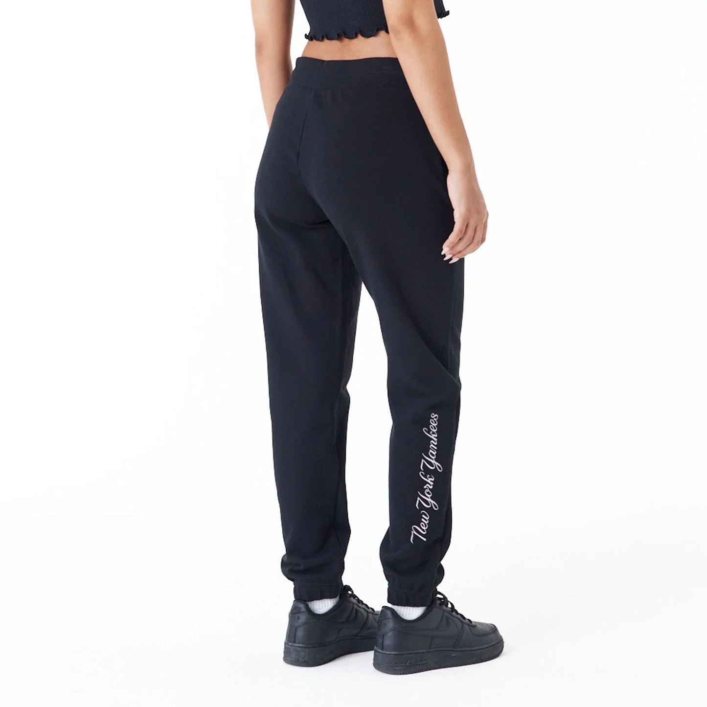 The Female model is wearing New York Yankees Womens MLB Lifestyle Black Joggers 3