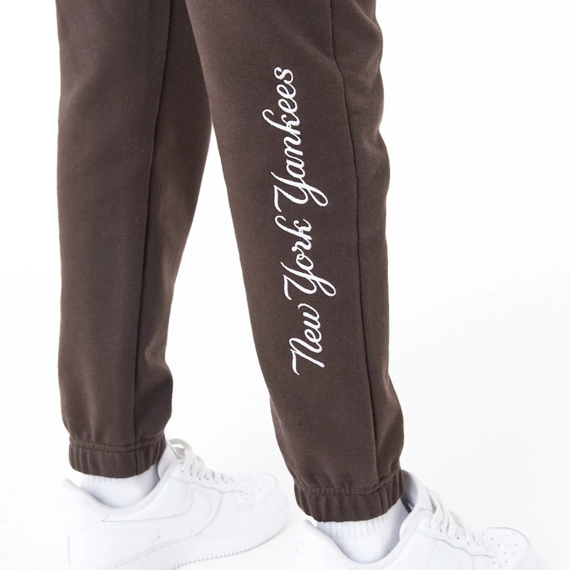 The Female model is wearing New York Yankees MLB Lifestyle Brown Joggers 8