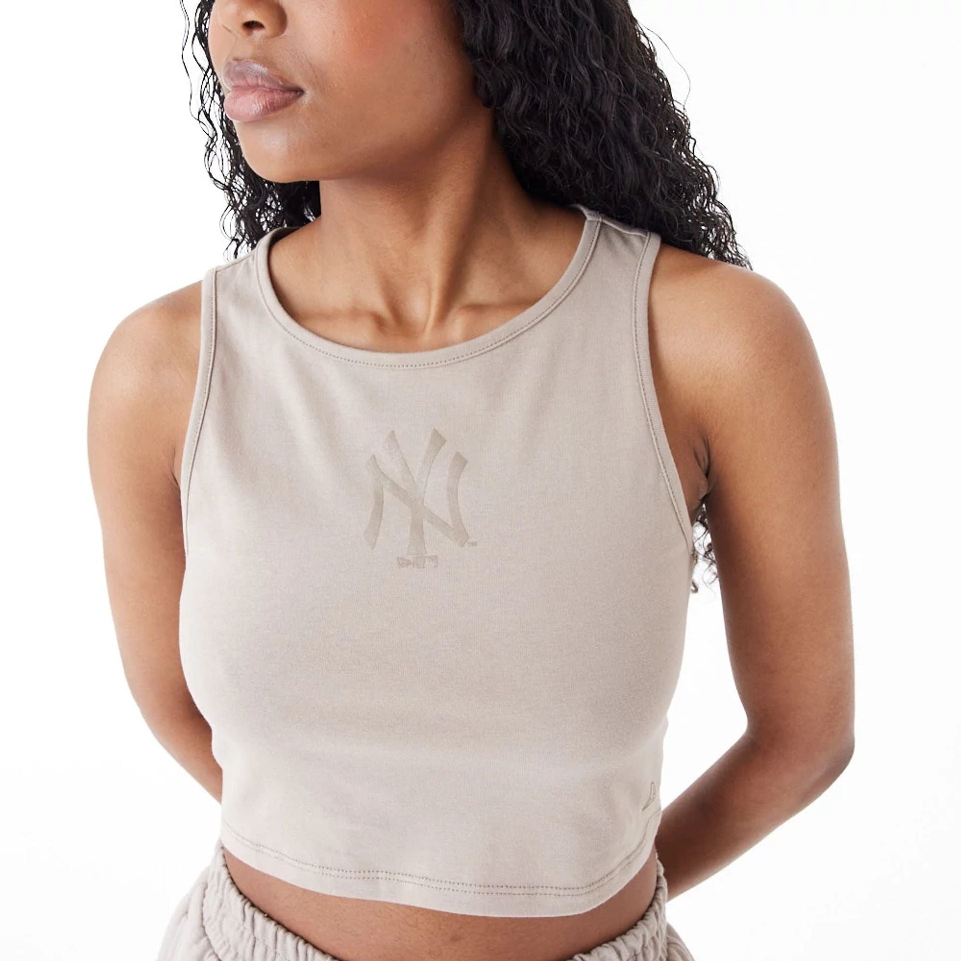 The Female model is wearing New York Yankees Womens MLB Lifestyle Brown Crop Tank Top 6