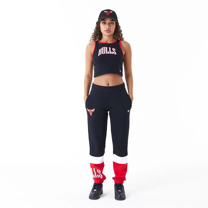 The Female model is wearing Chicago Bulls Womens Womens NBA Team Wordmark Black Crop Tank Top 4