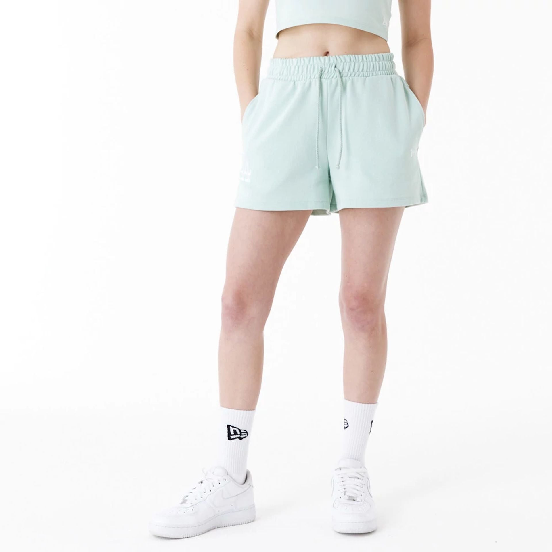 The Female model is wearing LA Dodgers Womens MLB Lifestyle Green Shorts 1