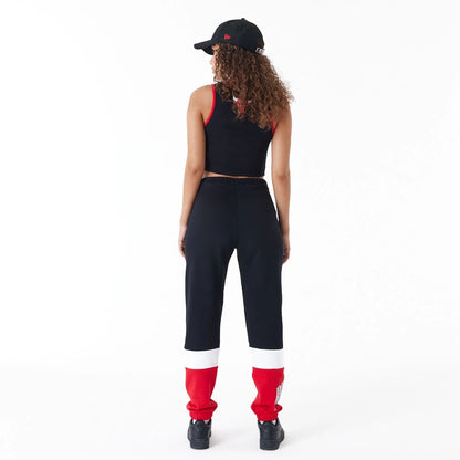 The Female model is wearing Chicago Bulls NBA Colour Block Black Joggers 3