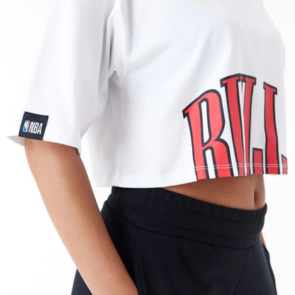 The Female model is wearing Chicago Bulls Womens NBA Team Wordmark White Crop T-Shirt 8