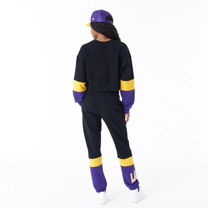 The Female model is wearing LA Lakers Womens NBA Colour Block Black Crop Crew Neck Sweatshirt 8