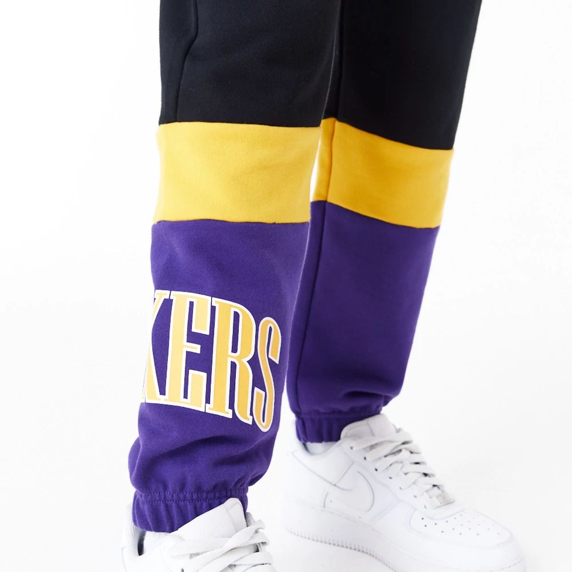 The Female model is wearing LA Lakers Womens NBA Colour Block Black Joggers 4