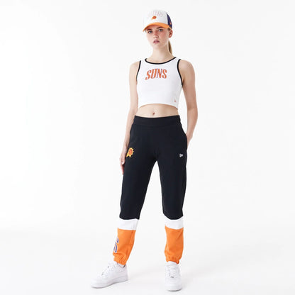 The Female model is wearing Phoenix Suns Womens NBA Team Wordmark White Crop Tank Top 4