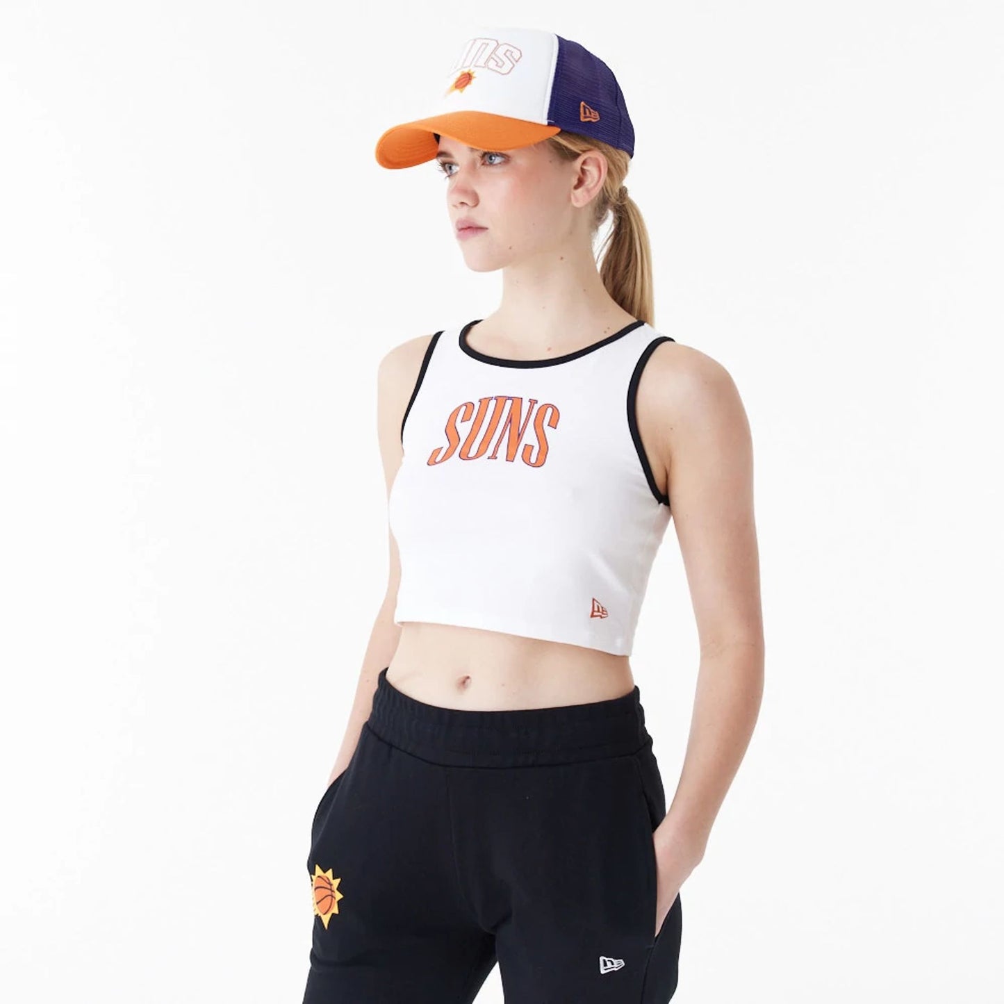 The Female model is wearing Phoenix Suns Womens NBA Team Wordmark White Crop Tank Top 1