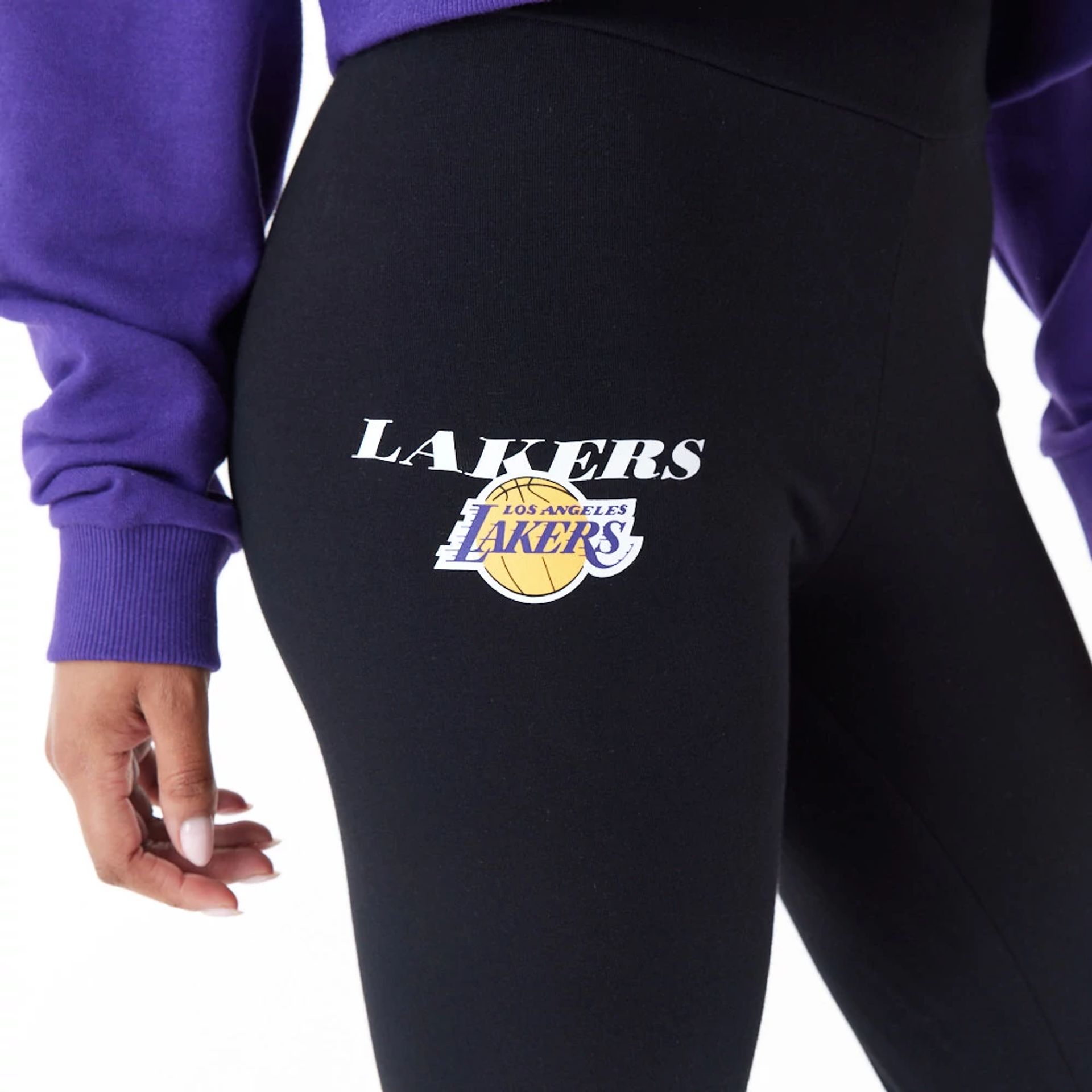 The Female model is wearing LA Lakers Womens NBA Team Logo Black Leggings 7