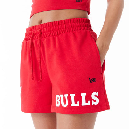 The Female model is wearing Chicago Bulls Womens NBA Team Logo Red Shorts 6