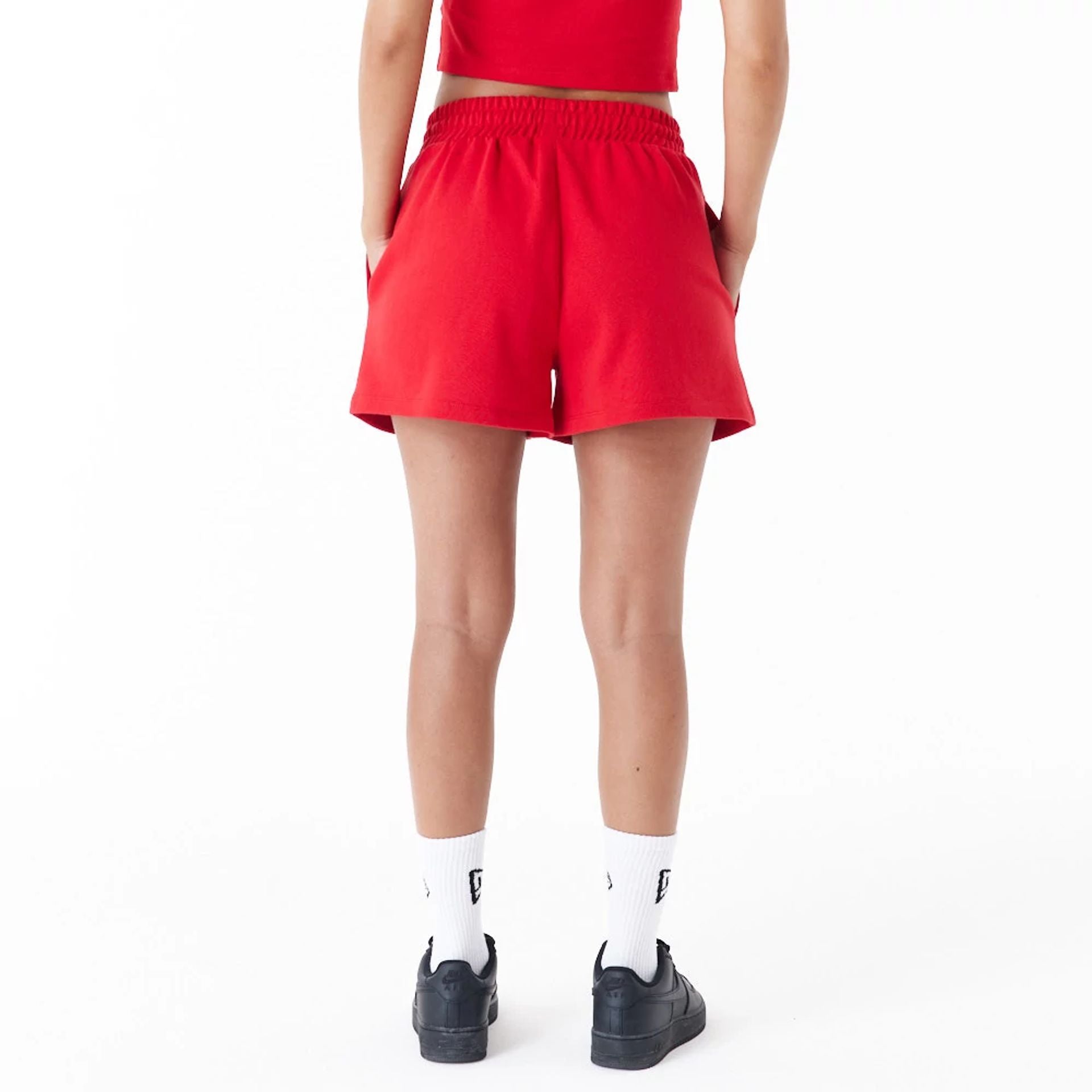 The Female model is wearing Chicago Bulls Womens NBA Team Logo Red Shorts 2