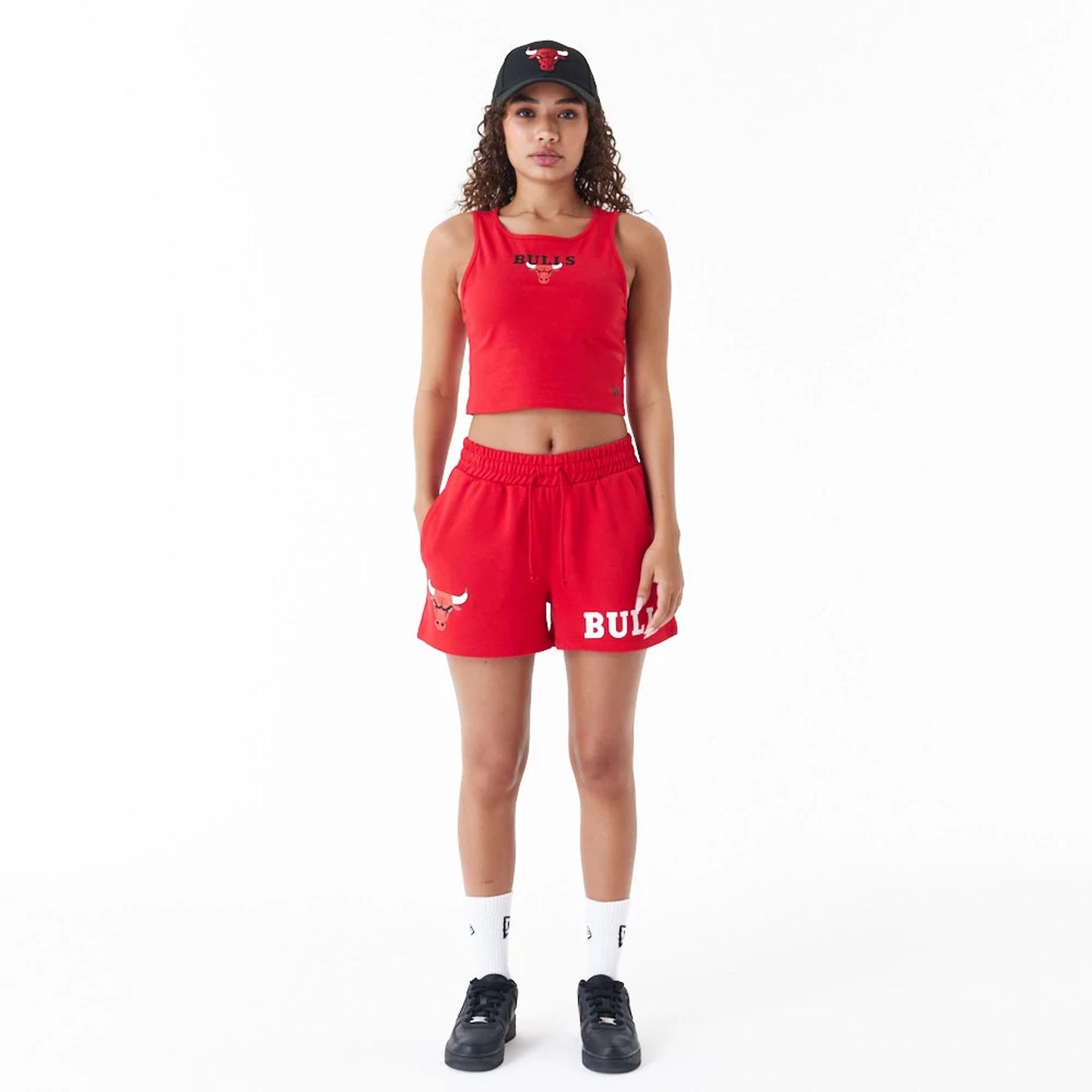 The Female model is wearing Chicago Bulls Womens NBA Team Logo Red Shorts 3