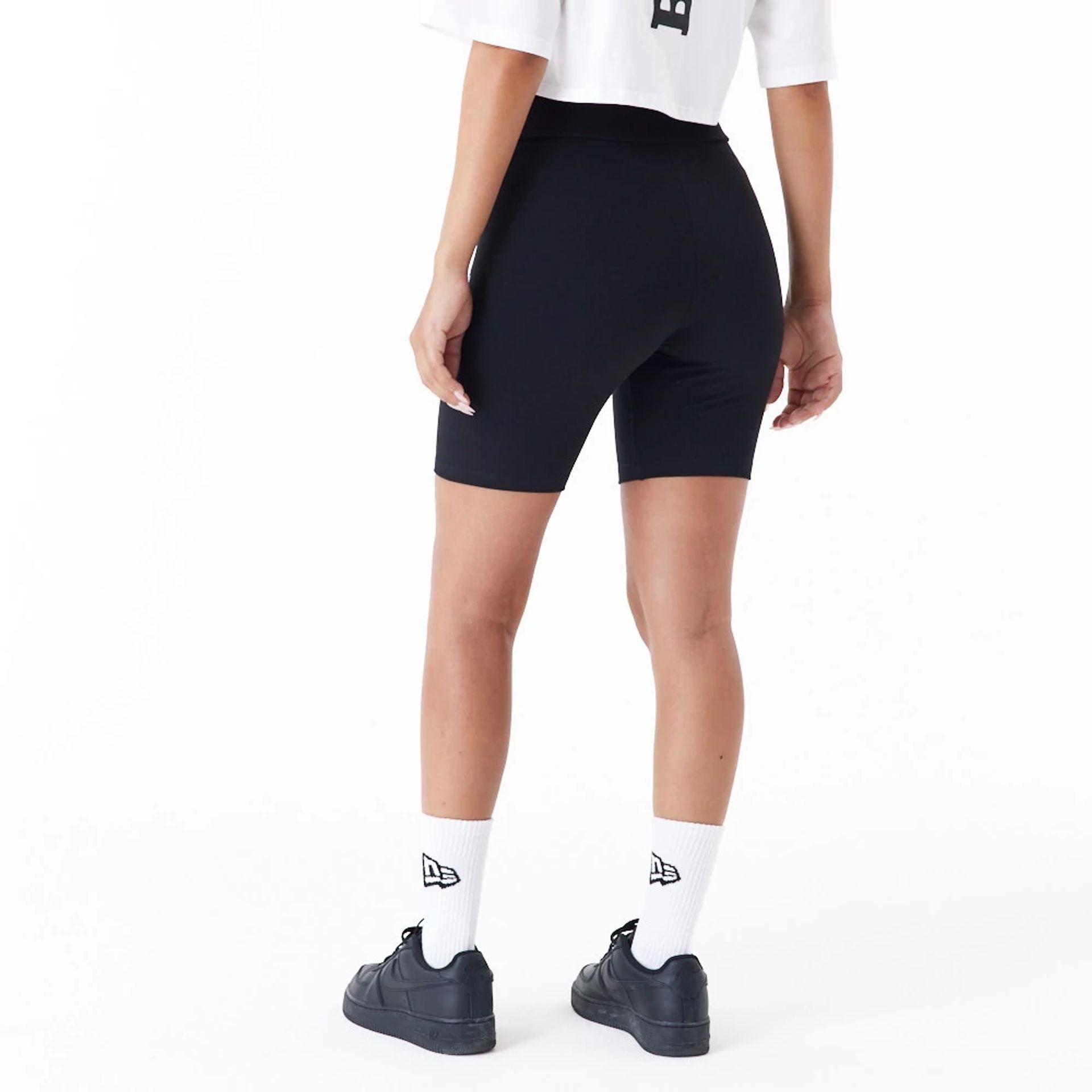 The Female model is wearing Chicago Bulls Womens NBA Logo Black Cycling Shorts 5