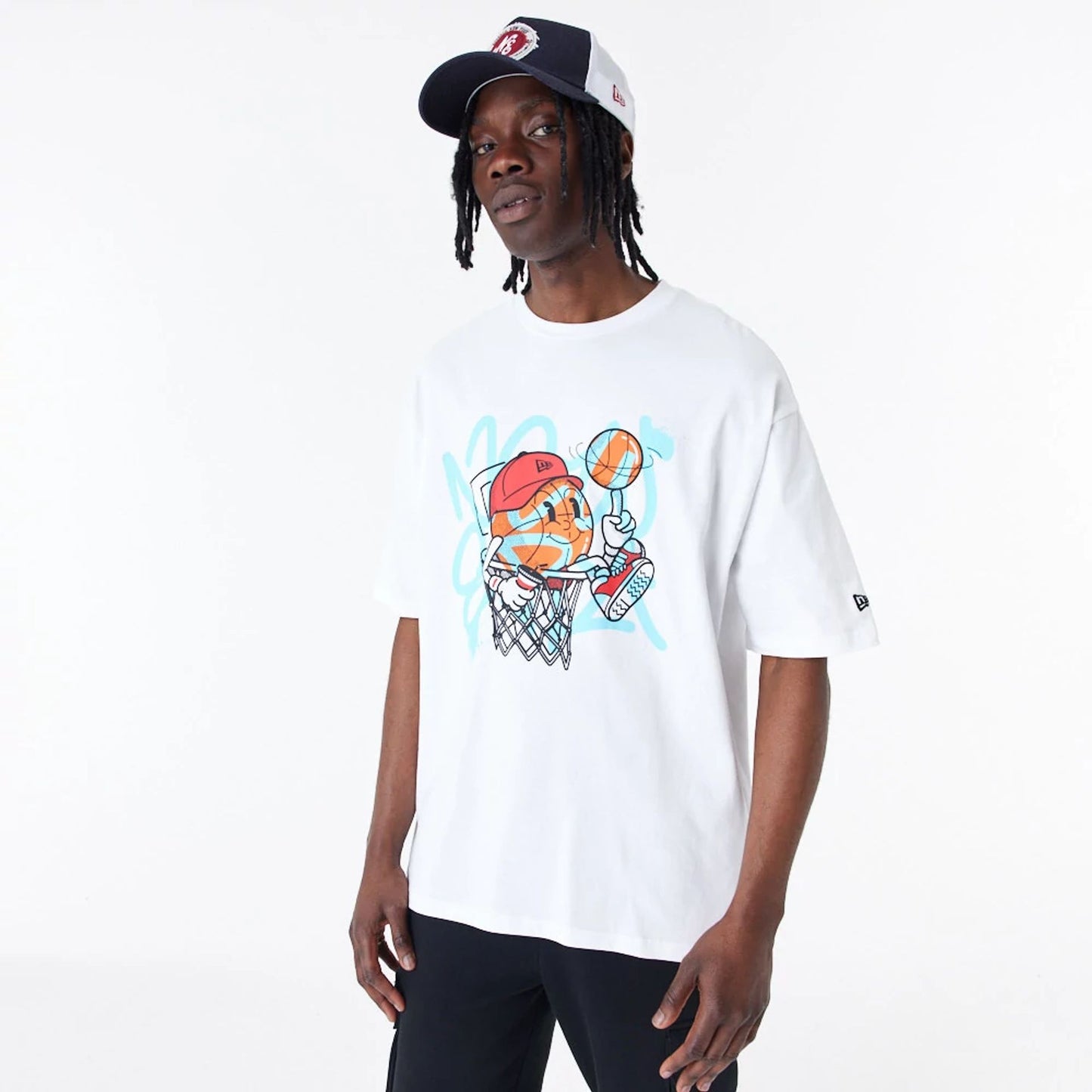 The Male model is wearing New Era Spray Graphic White Oversized T-Shirt 1